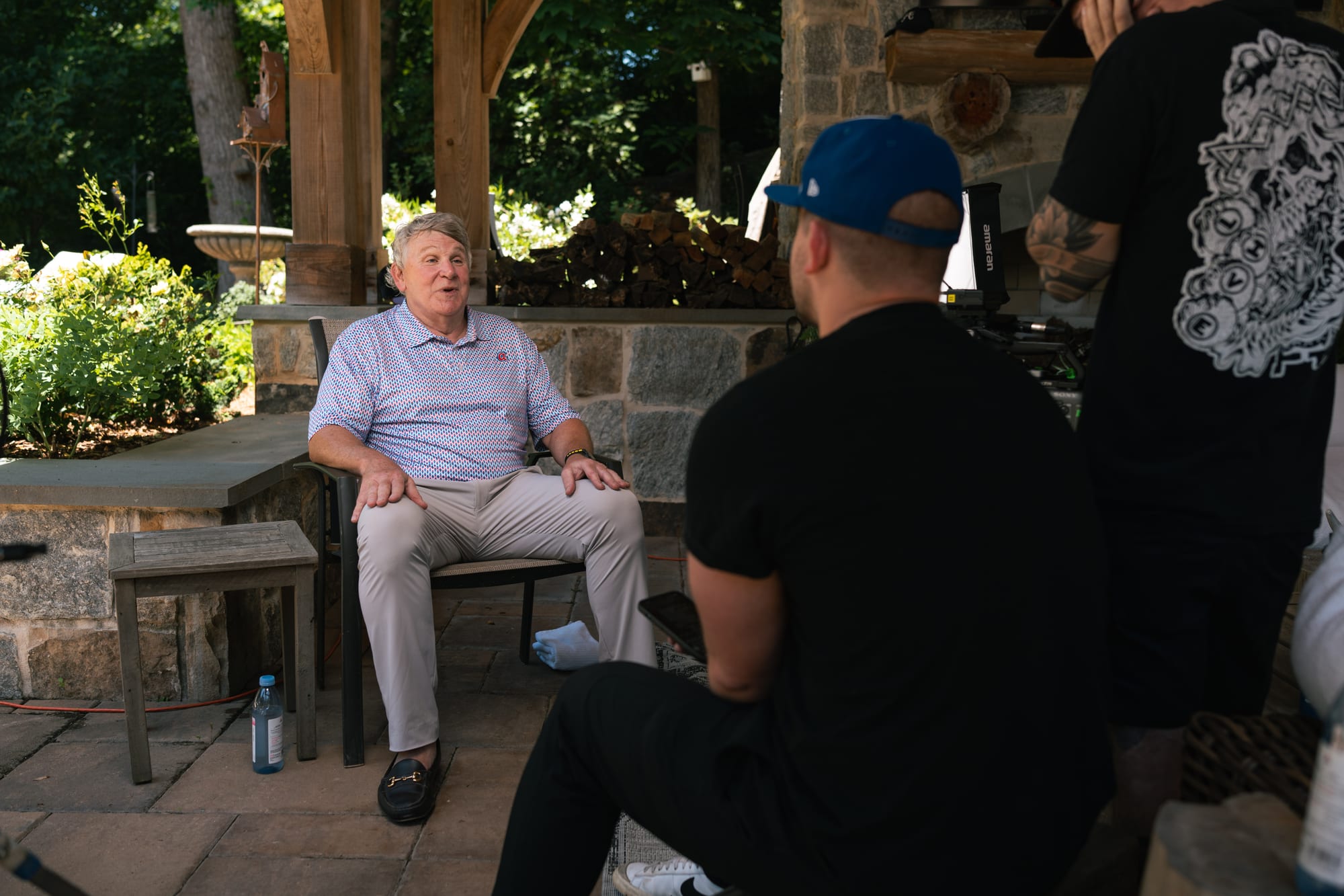Camera operators on location for interview
