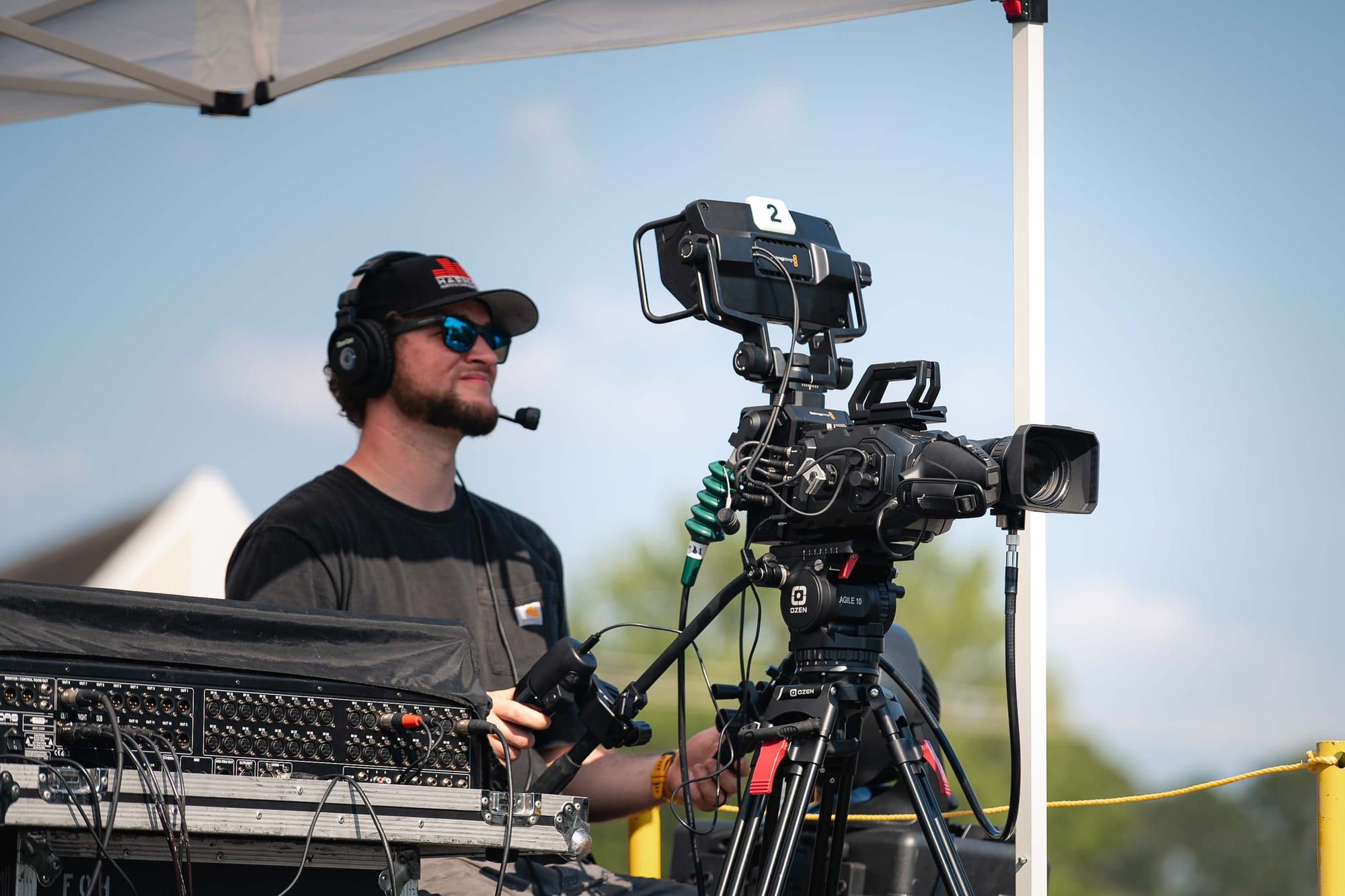Broadcast camera operator at the festival stage