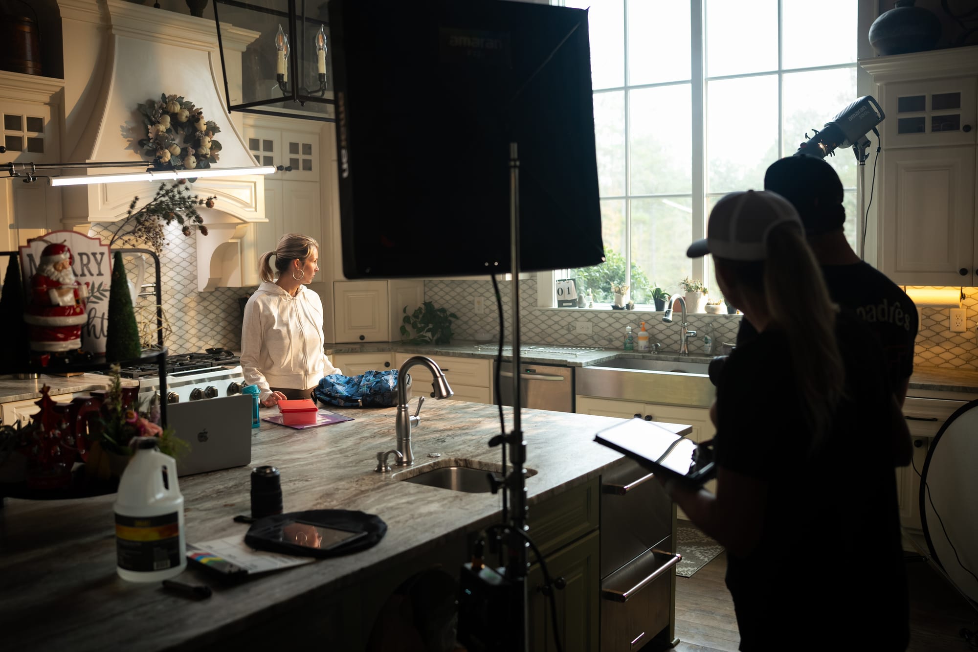 Reflection of talent in a window during filming