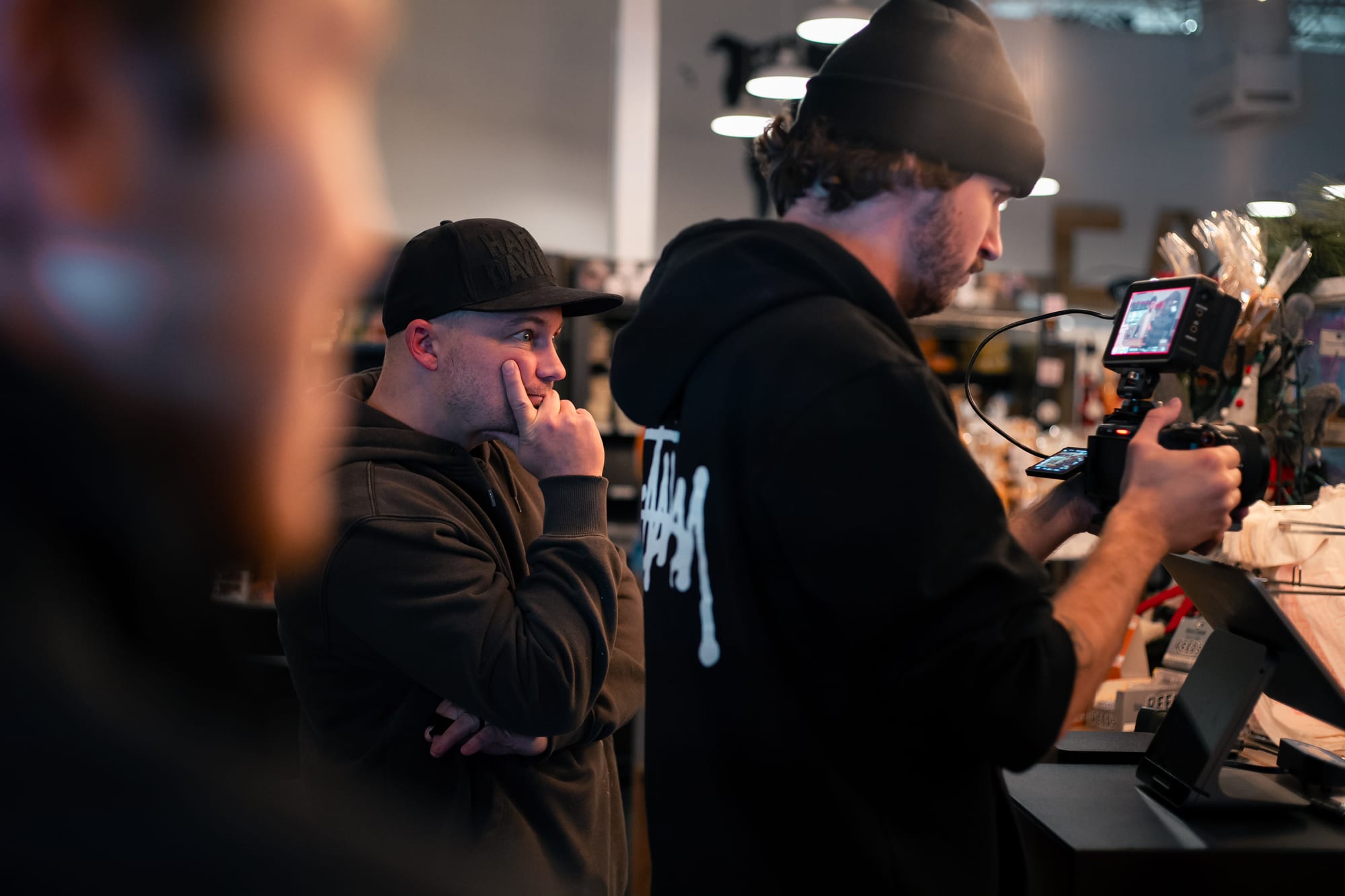 Director and camera operator reviewing a shot indoors