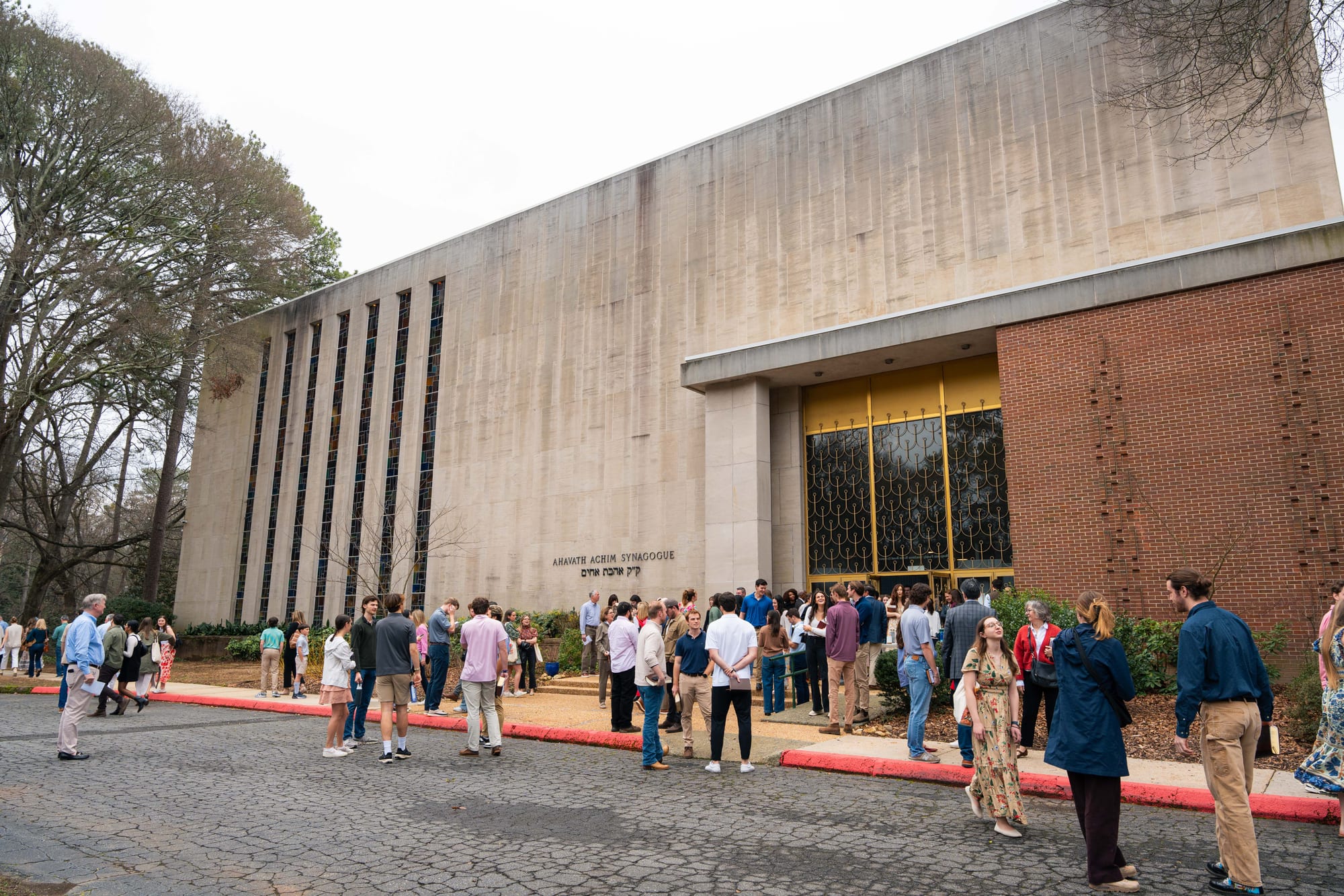 Synagogue exterior with congregation