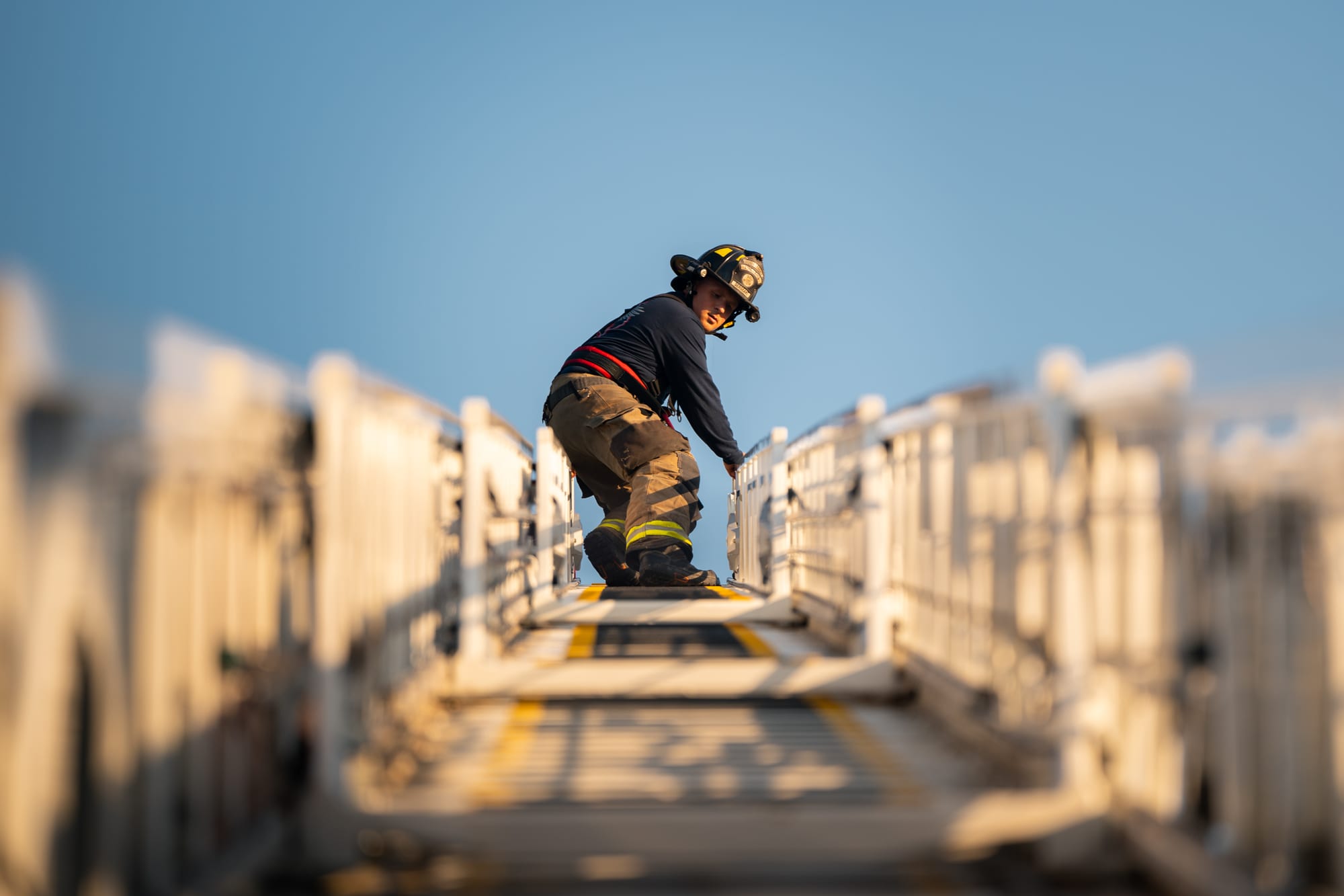 Firefighter on ladder truck