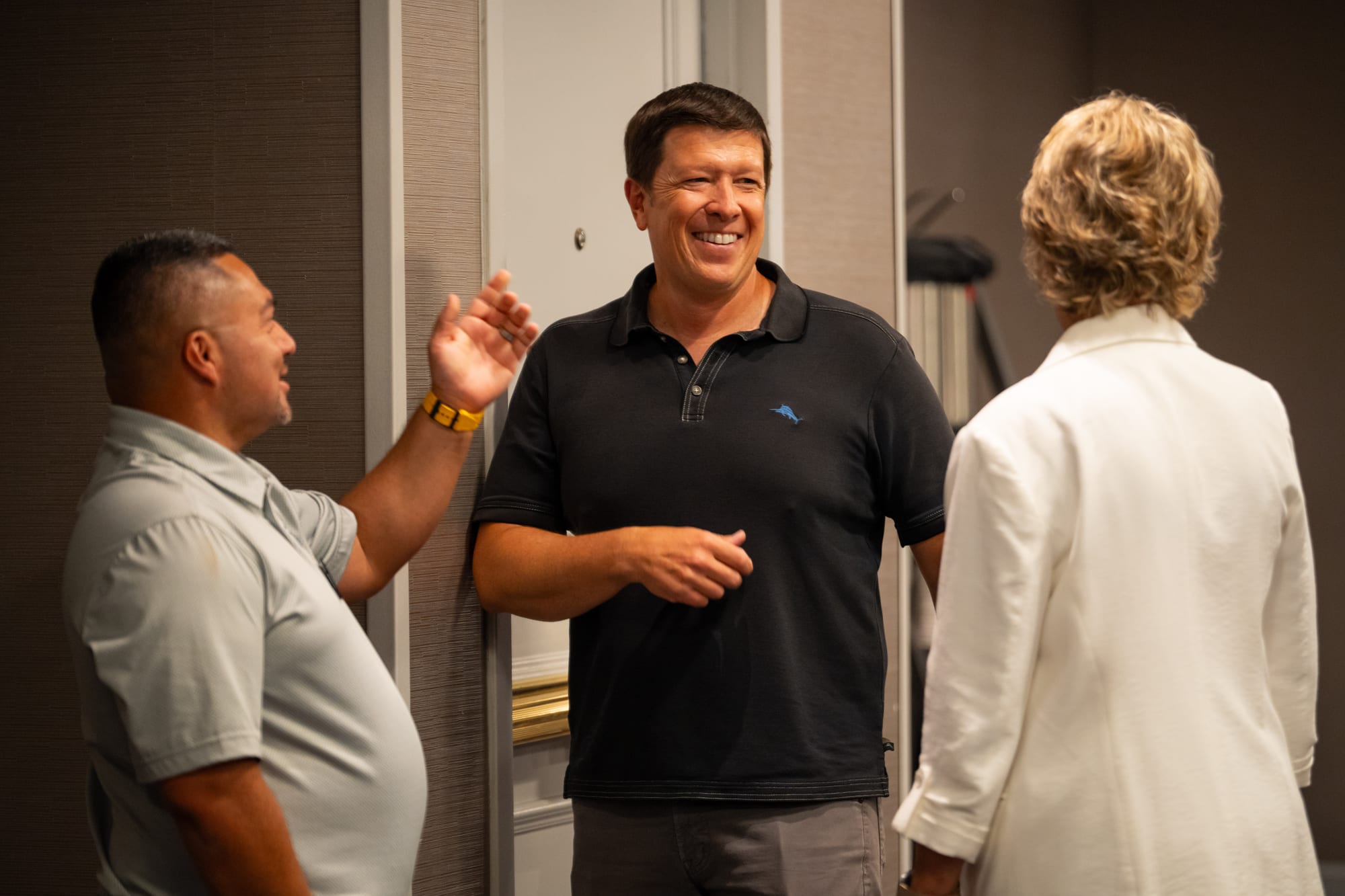 Attendees networking at a conference