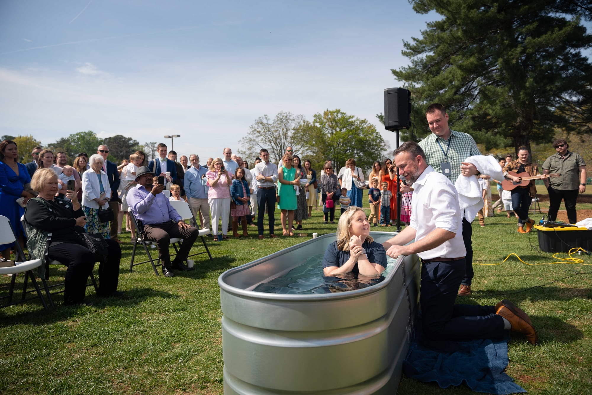 Baptism ceremony with crowd