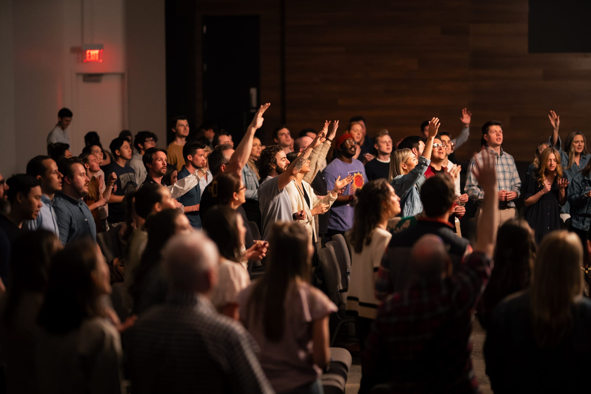 Worship crowd with hands raised