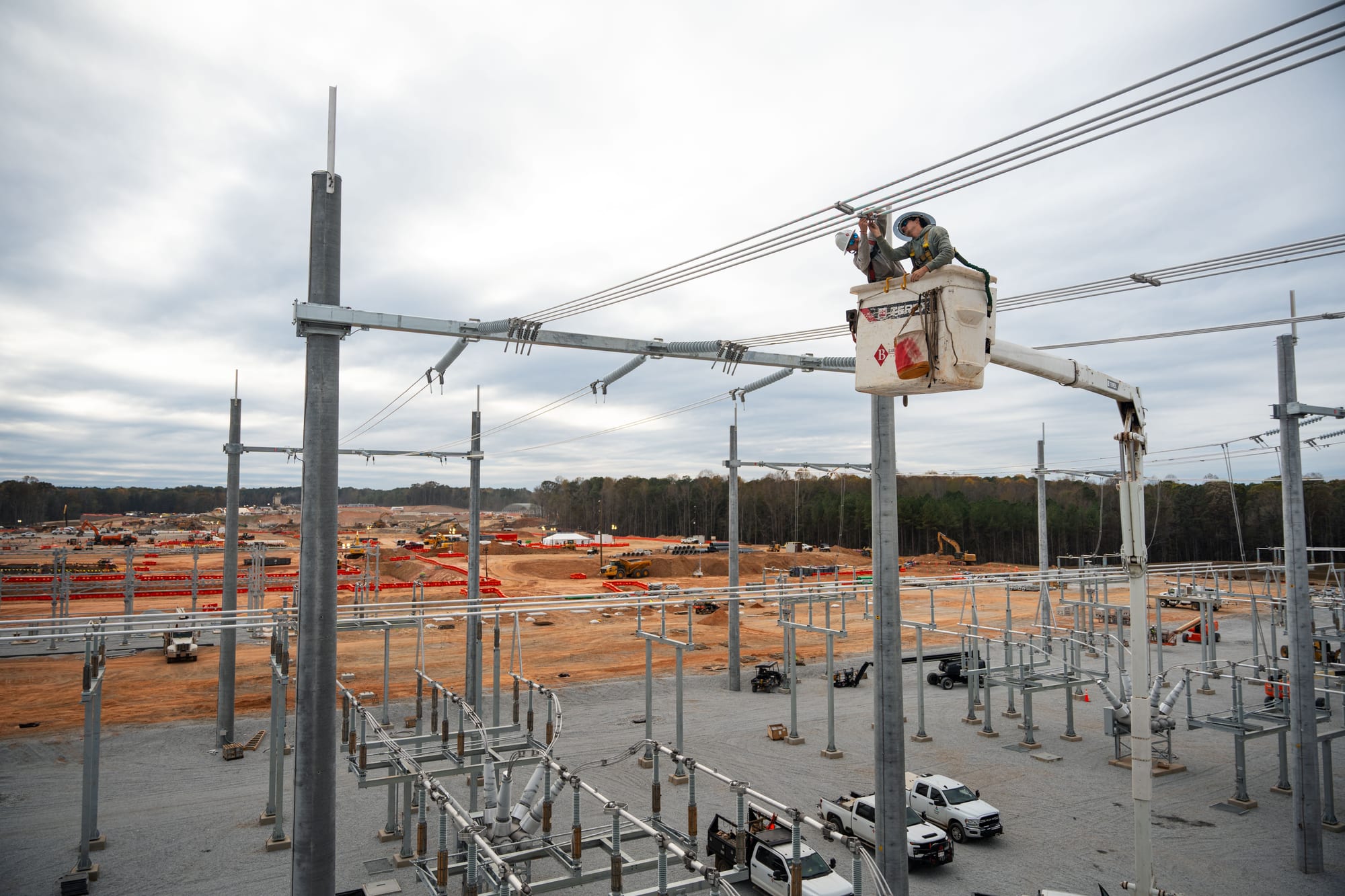 Utility linemen working on power lines