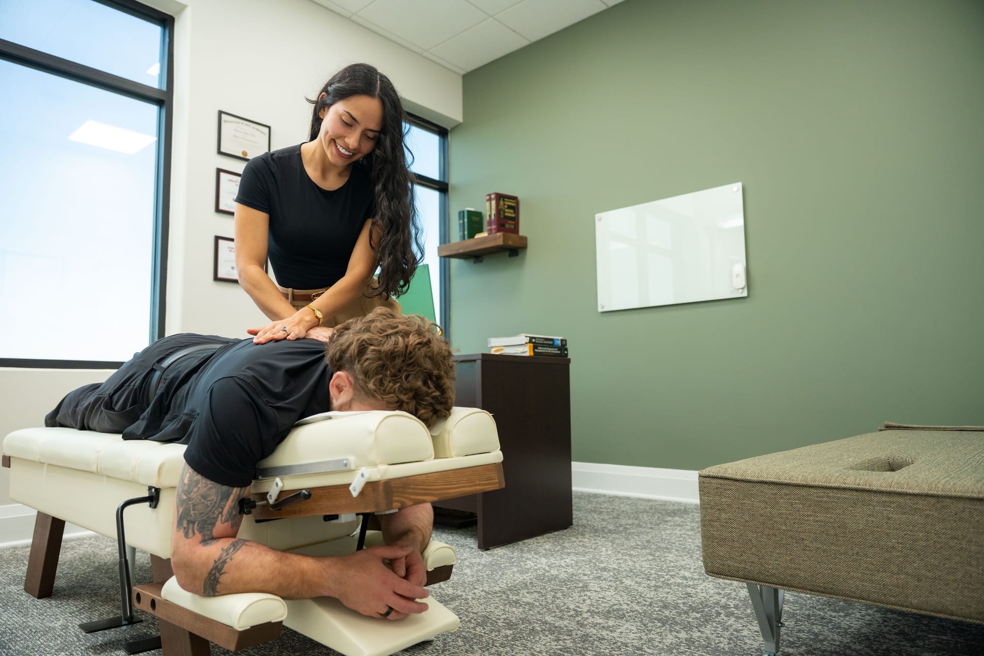 Chiropractor adjusting a patient