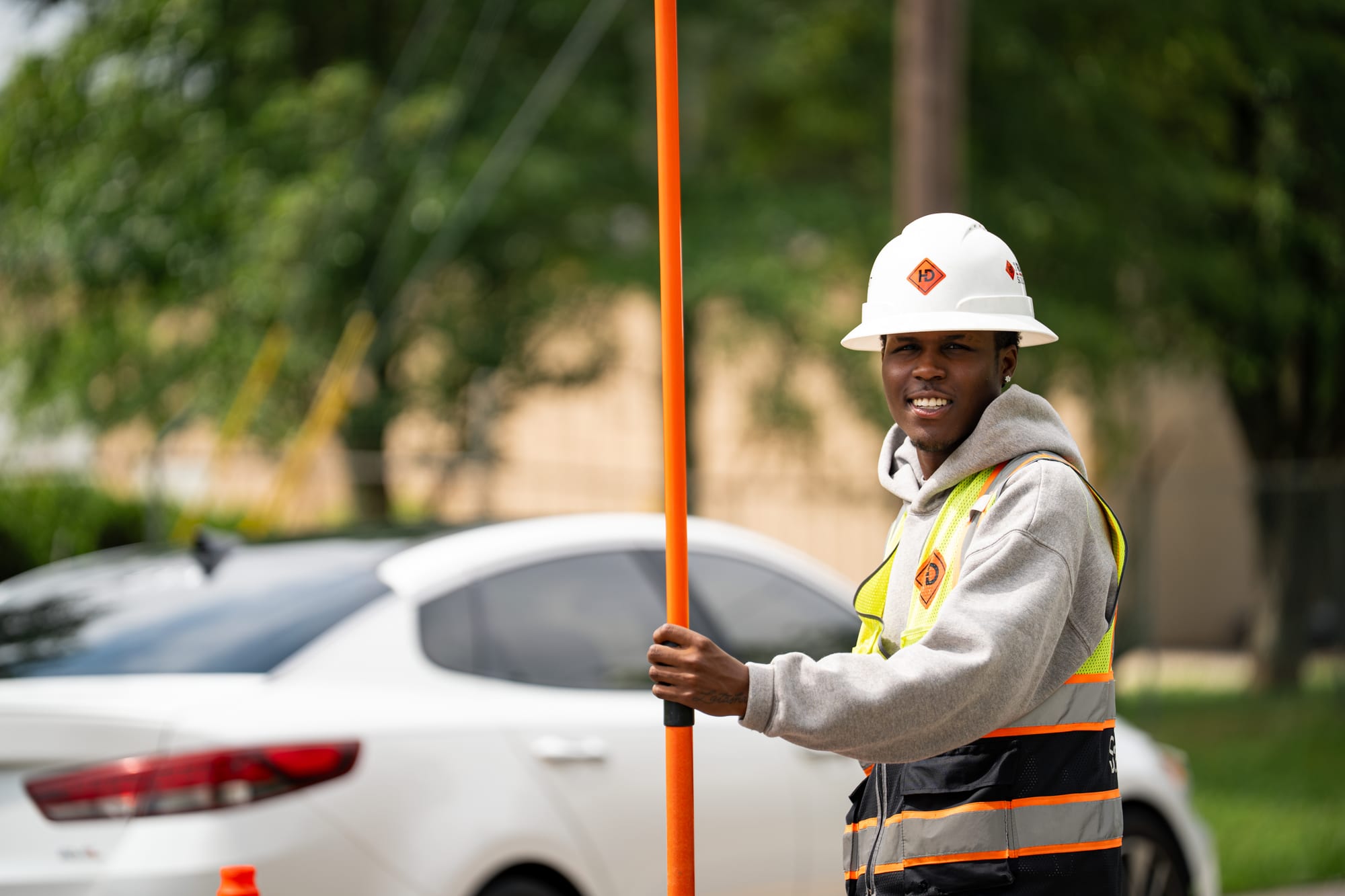 Surveyor with grade rod